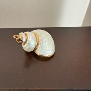 Shell pendant with gold accent